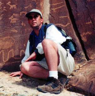 Steve Dahl exploring petroglyphs in Moab Utah